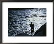 Silhouetted Man Bathing In The Colorado River At Twilight by Kate Thompson Limited Edition Pricing Art Print