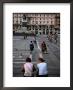 Two Women Chatting On Piazza Del Duomo, Milan, Italy by Martin Moos Limited Edition Print