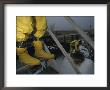 Men In Protective Clothing Check Hazardous Chemical Storage Tanks by Joel Sartore Limited Edition Print