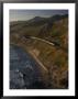 The Coast Starlight Train Snakes Past The Santa Ynez Mountains, California by Phil Schermeister Limited Edition Print