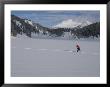 A Woman Heads Out Into The Snowy Wind River Mountains by Bobby Model Limited Edition Print