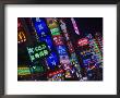 Neon Signs Line Storefronts Along Nanjing Road, Shanghai, China by Paul Souders Limited Edition Print