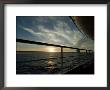 Looking At Sunset Through The Railing On The Deck Of A Cruise Ship by Todd Gipstein Limited Edition Print