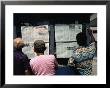 Men Reading The Daily Newspaper At An Inner City Kiosk, Havana, Cuba by Rick Gerharter Limited Edition Print