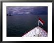 Flag At Front Of Boat On Lake Constance (Bodensee), Baden-Wurttemberg, Germany by Johnson Dennis Limited Edition Print