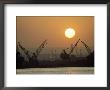 Silhouetted Gantries At Shipyard by Doug Mazell Limited Edition Print