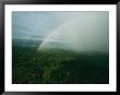 Aerial View Of A Rainbow Over The Lush Forests Of Gabon by Michael Nichols Limited Edition Print