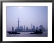 Water Traffic Along Huangpu River Passing Oriental Tv Tower And Pudong Skyline, Shanghai, China by Paul Souders Limited Edition Print