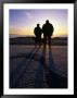 Two Men Watching Sunset Over Beach, Nazare, Portugal by Mason Florence Limited Edition Print