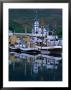 Traditional Oak Fishing Boats In Front Of Husavikurkirkja Church, Husavik, Iceland by Grant Dixon Limited Edition Pricing Art Print