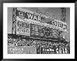 Large Scoreboard Towering Over Fans Showing Baseball Scores From Around The League by Wallace Kirkland Limited Edition Print
