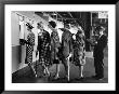 5 Models Wearing Fashionable Dress Suits At A Race Track Betting Window, At Roosevelt Raceway by Nina Leen Limited Edition Print