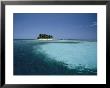 Blue Ocean Waters With A Palm-Covered Island At Silk Cay, Belize by Ed George Limited Edition Pricing Art Print