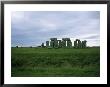 Gray Clouds Over The Ancient Ruins Of Stonehenge by Joel Sartore Limited Edition Print