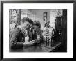 Teenage Girls Drinking Milkshakes At A Local Restaurant by Francis Miller Limited Edition Pricing Art Print