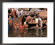 Ritual Bath At Dawn In Ganges River, India by Jacob Halaska Limited Edition Print