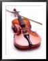 A Violin On A White Background by Fogstock Llc Limited Edition Print