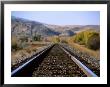Railroad Tracks In Fall, Livingston, Mt by Larry Stanley Limited Edition Print