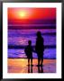 Sunset Silhouette Of Mom And Boy Along Coast by Russell Burden Limited Edition Pricing Art Print