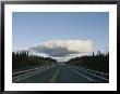 A Thundercloud Forms Above The Makenzie Highway by Raymond Gehman Limited Edition Print