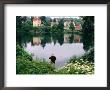 Man Fishing In Lake In In Oliwa, Gdansk, Poland by Rick Gerharter Limited Edition Print