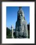 Statue At Burial Ground With Surrounding Tombstones, Masan, Gyeongsangnam-Do, South Korea by Eric Wheater Limited Edition Print