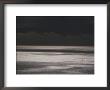 A Lone Boat Sails On A Silvery Sea by Jodi Cobb Limited Edition Print