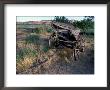 Old Wagon Behind The Cow Canyon Trading Post, Bluff, Utah, Usa by Jerry & Marcy Monkman Limited Edition Print