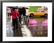 Pedestrians In A Times Square Crosswalk On A Rainy Afternoon by Ira Block Limited Edition Print