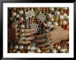 Close-Up Of A Bride's Hands Displays Silver Rings Against Necklaces by James L. Stanfield Limited Edition Print