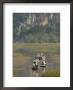 Punting Boats On Delta River, Limestone Mountain Scenery, Van Long, South Of Hanoi by Christian Kober Limited Edition Print