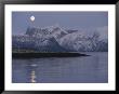 The Moon Rises Over Mountains At Waters Edge In The Norwegian Arctic by Brian J. Skerry Limited Edition Print