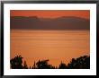 Sunset Paints The Sea Of Galilee Orange by Annie Griffiths Belt Limited Edition Print