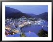 Town & Harbor At Night, Epirus, Greece by Walter Bibikow Limited Edition Print