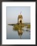 Small Hindu Temple In Middle Of The Narmada River, Maheshwar, Madhya Pradesh State, India by R H Productions Limited Edition Print