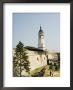 Clock Tower And Modern Military Cannon In The Grounds Of The Kalemegdan Citadel, Belgrade, Serbia by Christian Kober Limited Edition Print