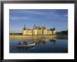 Boats On Water In Front Chateau Chambord, Unesco World Heritage Site, Loir-Et-Cher, Centre, France by Charles Bowman Limited Edition Print
