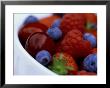 Summer Fruits In White Ceramic Bowl: Strawberries, Raspberries, Blueberries And Cherries by James Guilliam Limited Edition Print