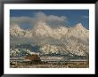A View Of The Mormon Row Barn And The Grand Tetons Behind by Ira Block Limited Edition Pricing Art Print