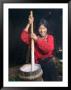 Tibetan Girl Making Butter Tea Inside The Yurt, Dingqing, Tibet, China by Keren Su Limited Edition Print