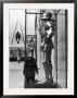 Little Boy Staring Up At Medieval Suit Of Armor In The Metropolitan Museum Of Art by Alfred Eisenstaedt Limited Edition Pricing Art Print