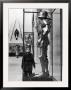 Little Boy Staring Up At Medieval Suit Of Armor In The Metropolitan Museum Of Art by Alfred Eisenstaedt Limited Edition Print