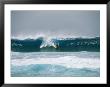 Surfer Rides A Breaking Wave In The Bonsai Pipeline In Oahu by Todd Gipstein Limited Edition Print