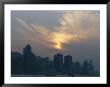 View Of The Hong Kong Skyline At Sunset by Raul Touzon Limited Edition Pricing Art Print