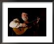 A Cowboy Sings Along To The Song His Guitar Is Playing by Taylor S. Kennedy Limited Edition Print