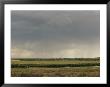 Storm Clouds And A Lightning Bolt Near Grand Junction, Colorado by Richard Nowitz Limited Edition Print