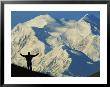 A Hiker Silhouetted Against Snow-Covered Mount Mckinley by Joel Sartore Limited Edition Print