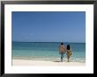 Couple Walking On Sandy Beach, Chapera Island (Contadora), Las Perlas Archipelago, Panama by Sergio Pitamitz Limited Edition Print