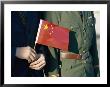 A Pair Of Hands Holds The National Flag Of China by Paul Chesley Limited Edition Print