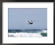 Windsurfer Jumping Waves At Jalama Beach, California by Rich Reid Limited Edition Print